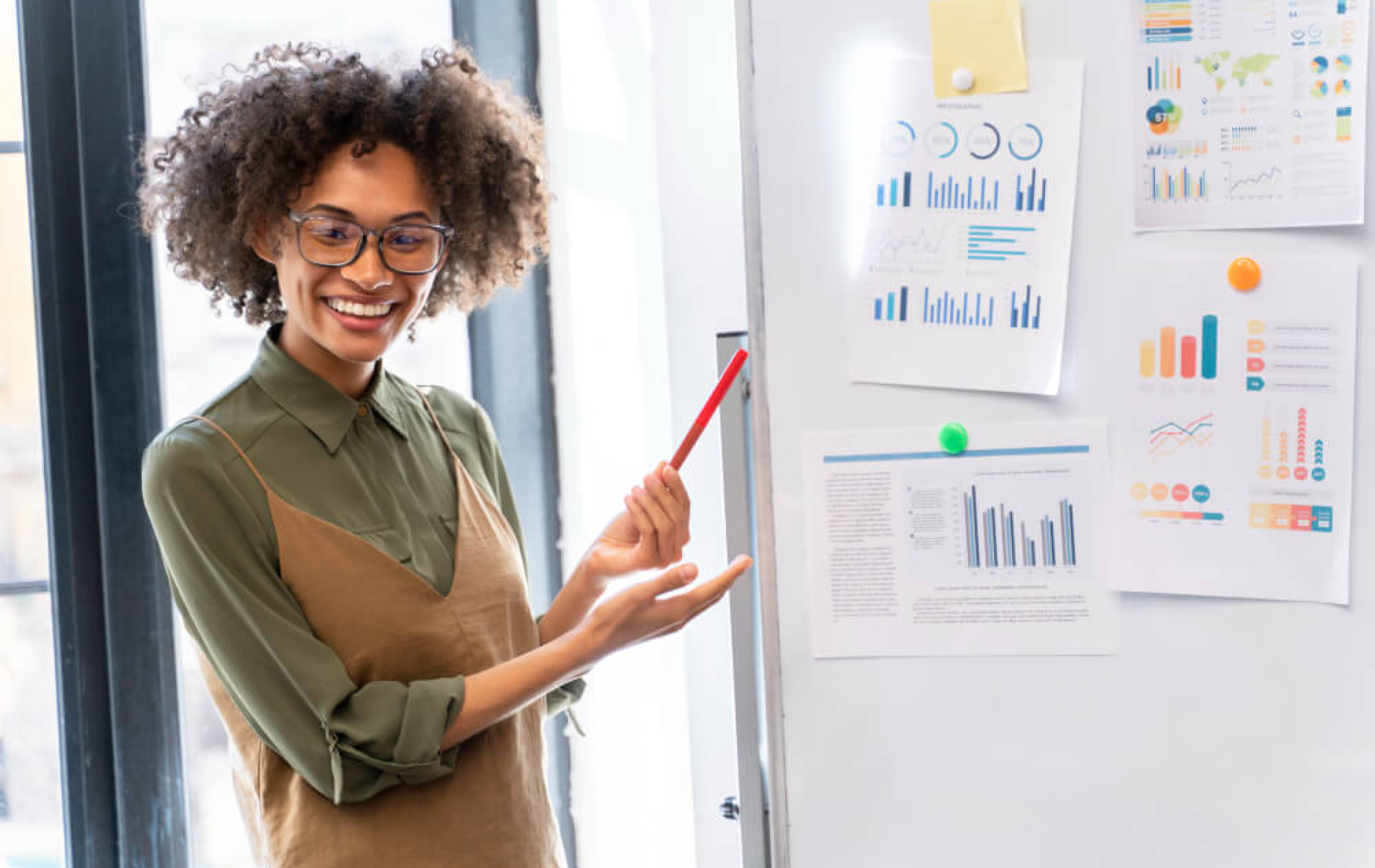digital marketing for beginners in 2025 - A lady reading through whats written on a whiteboard